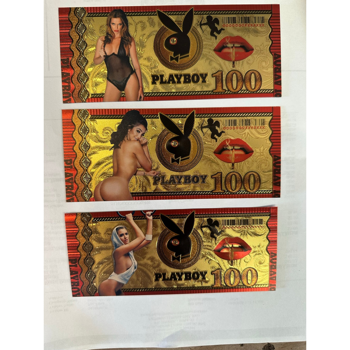 with this 12-piece Playboy-themed novelty foil note set. Features a reflective g