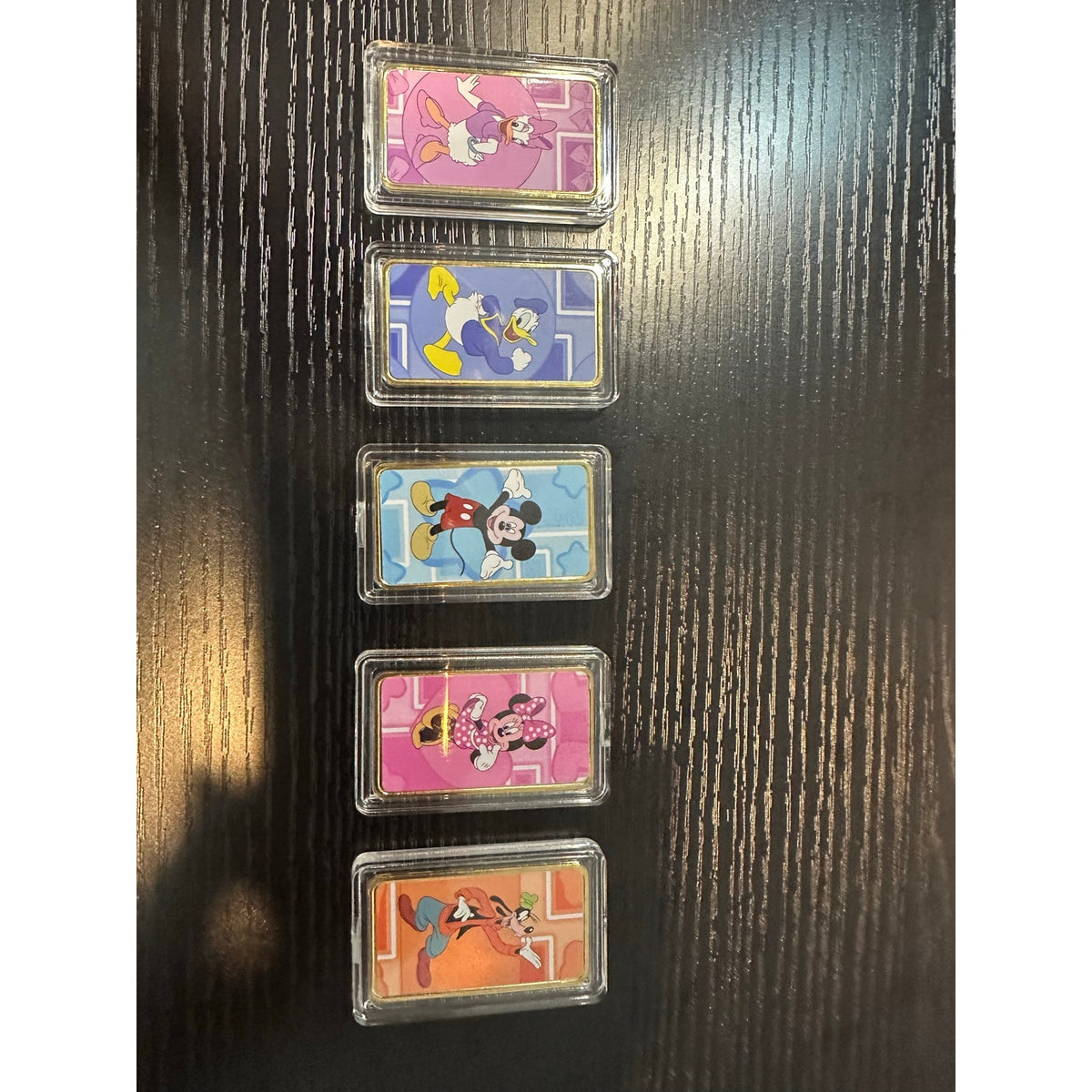 Bring classic character charm to your collection with this colorful 5-piece collectible bar set!